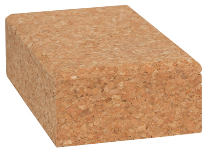 Rektangulär slipkloss i kork, texturliknande yta.