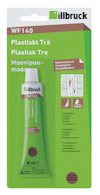 Förpackning av illbruck WF140 plastiskt trä i tub, 40 ml, med text på flera språk inklusive svenska och finska.