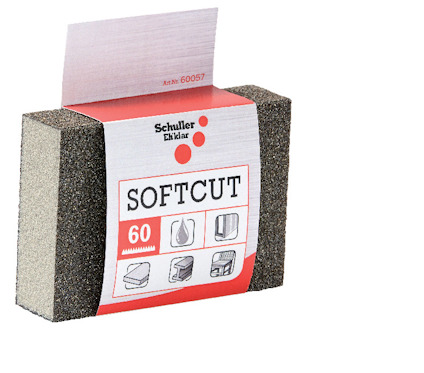 Rektangulär slipsvamp med etikett i röd och vit design, märkt "Schuller Eh'klar Softcut".