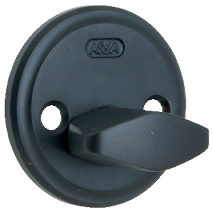 Svart dörrvred med två små hål och texten "ASSA" ovanför vredet.