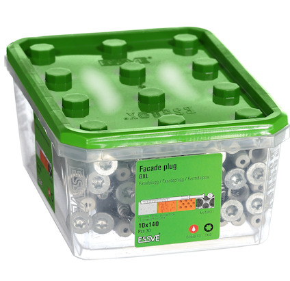 Transparent förpackning med grönt lock innehållande fasadpluggar, etikett med texten "Facade plug 6XL, 10x140, 30 st".
