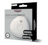 Förpackning med Housegard Pebble 10 brandvarnare. Text: "Smoke Alarm Pebble 10," "Pause and Test Button Feature," "Sealed for Life Battery, 10 Years."